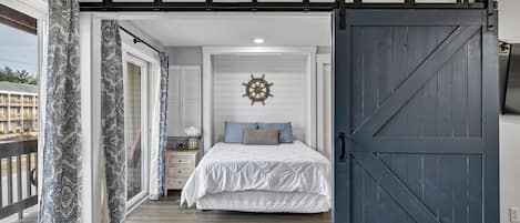 Queen bed, sliding barn doors for privacy from living room
