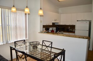 Dining table and kitchen