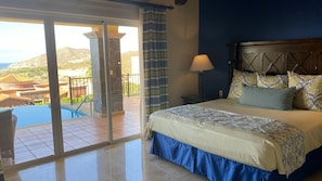 King Owners Suite with en-suite full bathroom overlooking the pool! 