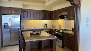 Stainless steel appliances, gas range and every imaginable utensil!  