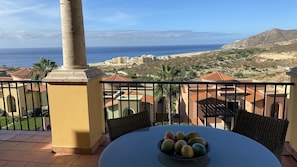 Balcony on upper second floor with dining area and private jacuzzi