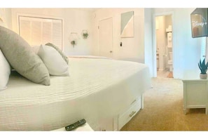 King bed in primary room, connected to balcony