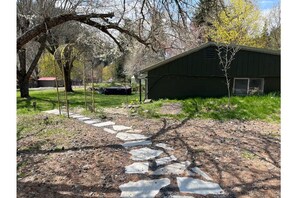 view of side of cabin which is a berm house.