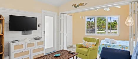 Bright and cheerful living area with beautiful coastal décor ensure the ideal island experience
