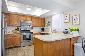 Fully stocked kitchen, everything provided for your stay.