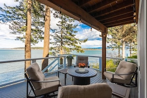 View!  High bank waterfront & deck right off the living room.