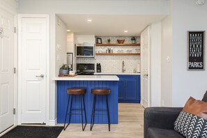 Newly renovoated full kitchen with breakfast nook. 