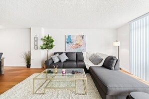 Cozy, bright living room with stylish decor – perfect for unwinding!