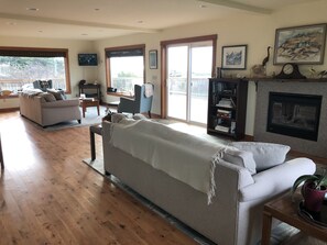 Two couches to fit your friends and family + an indoor fireplace in living room.