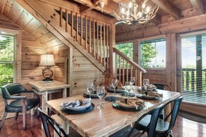 Comfortably enjoy the view at dinner inside or on the deck. Our table seats 8.
