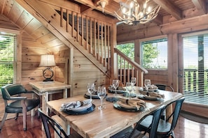 Comfortably enjoy the view at dinner inside or on the deck. Our table seats 8.