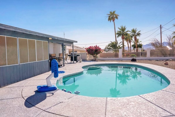 Enjoy the perfect blend of relaxation and fun by the pool.