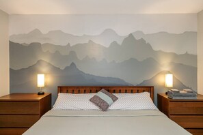 The master bedroom accent wall features mountain ranges from all over the country; Aspen, Grand Tetons, Glacier National Park and even the Blueridge Mountains make an appearance.