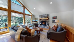 Living area with gas fireplace, a smart TV for streaming and VIEWS!!