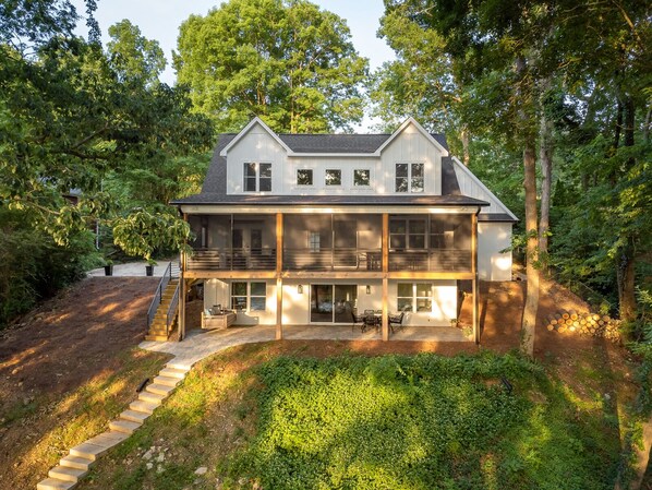 The lakeside view of the house.