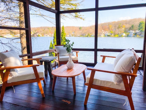 Covered Mahogany deck, perfect for drinks and hanging out