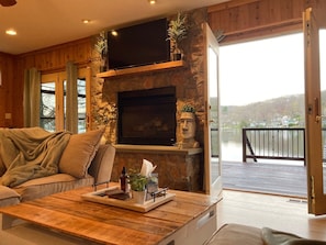 Cozy living room with a fireplace and Smart TV