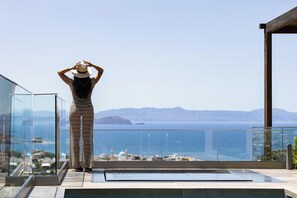 Relax by the hot tub and enjoy the panoramic view!