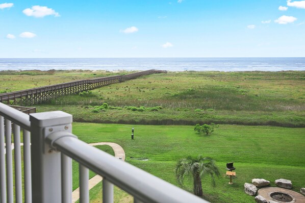 Your view. Fire pit and grill just outside your condo for bonfires & grilling.