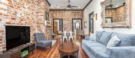 Waldburg Terrace living area with sleeper sofa and TV