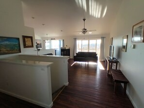 As you enter.  Spacious living room with vaulted ceiling.