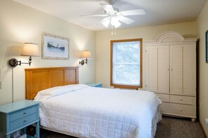 Primary bedroom with a queen bed and attached bath.
