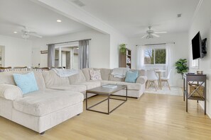 Living room with huge sectional plus additional seating