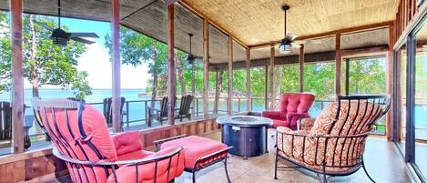 Screened deck with firepit.