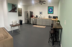 Kitchen and bar top table with stool seating 