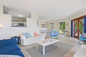 Open plan living & dining - light & bright with reverse cycle heating & cooling + underfloor heating in the winter months. 