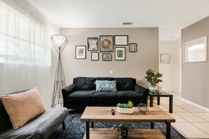 Bright and stylish living room, perfect to unwind after a long day 