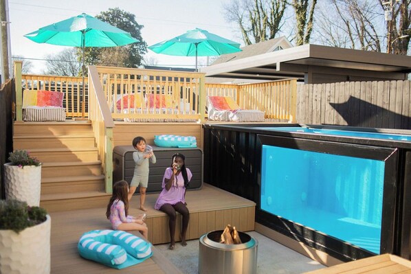 Dive into relaxation at The Savant! Our new container pool is perfect for cooling off after a day exploring Nashville. Roast marshmallows by the firepit, lounge in cozy chairs, & enjoy the shade of our umbrellas. Towels included-just bring the good vibes!