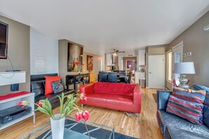 Main level dining area, open floor plan off the living room with sliding glass doors to the balcony and outstanding views of the Salt Lake Valley and mountains.  Amazing!