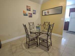 Spacious dining room area conveniently close to the kitchen, perfect for enjoy meals.