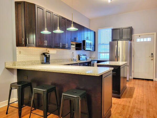 Upscale kitchen with an equally spacious dining room