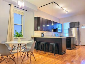 Upscale kitchen with an equally spacious dining room