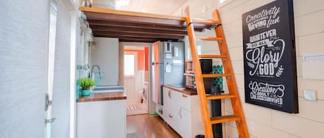 Loft accessible via ladder