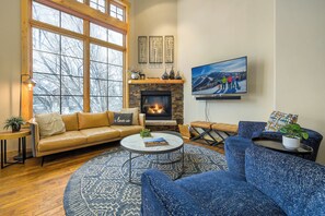 Cozy up next to the gas fireplace and flat screen TV