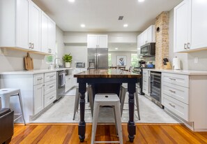 Kitchen with island, and all new appliances 