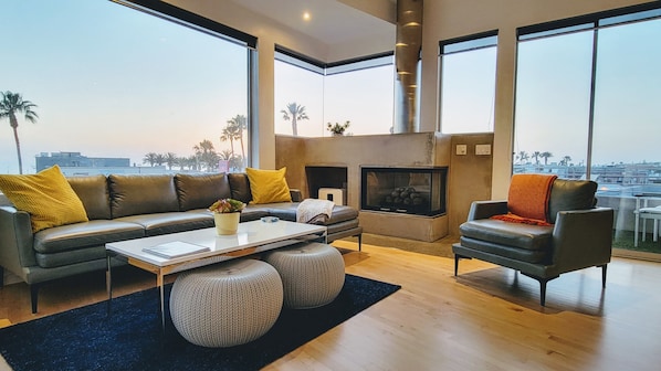Open and bright living area with fireplace.