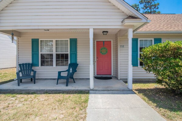 Front door access to the wonderful cottage in the quiet wooded section of Oak Island