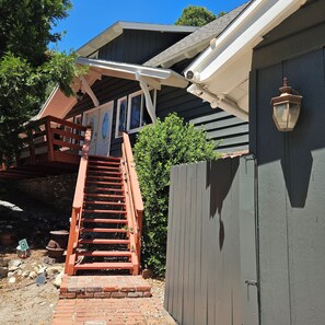 Walk directly from the driveway to the front door with one flight of stairs.