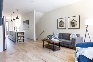 Our open concept living area, kitchen, and dining room are full of natural light!