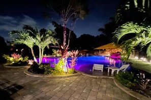 Nighttime Pool glow: swim under the stars in radiant serenity