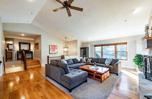 The spacious and cozy sectional couch provides ample room for games, kicking back and taking in your favorite show on the large flat-screen TV, listening to music on the Sonos sound system or warming up by the fire.