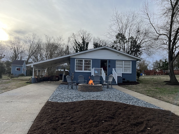 New fire pit in front yard with view of the lake