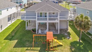 Newly installed playground from the back views of the back deck 