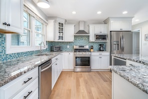 Lots of counter space and storage. Additional drink fridge, too!