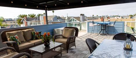 Enjoy the ocean breeze and sunset from the rooftop deck