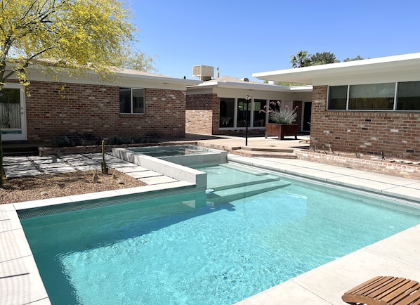 Multi-level pool + hot tub